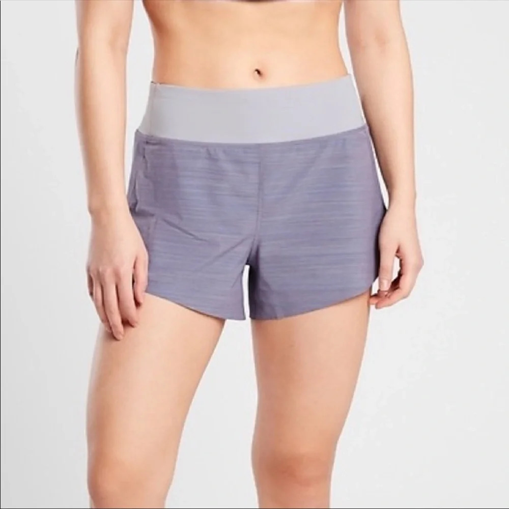Athleta Run With It Textured 3.5" Womens Shorts M Purple Zip Pocket Lined Logo